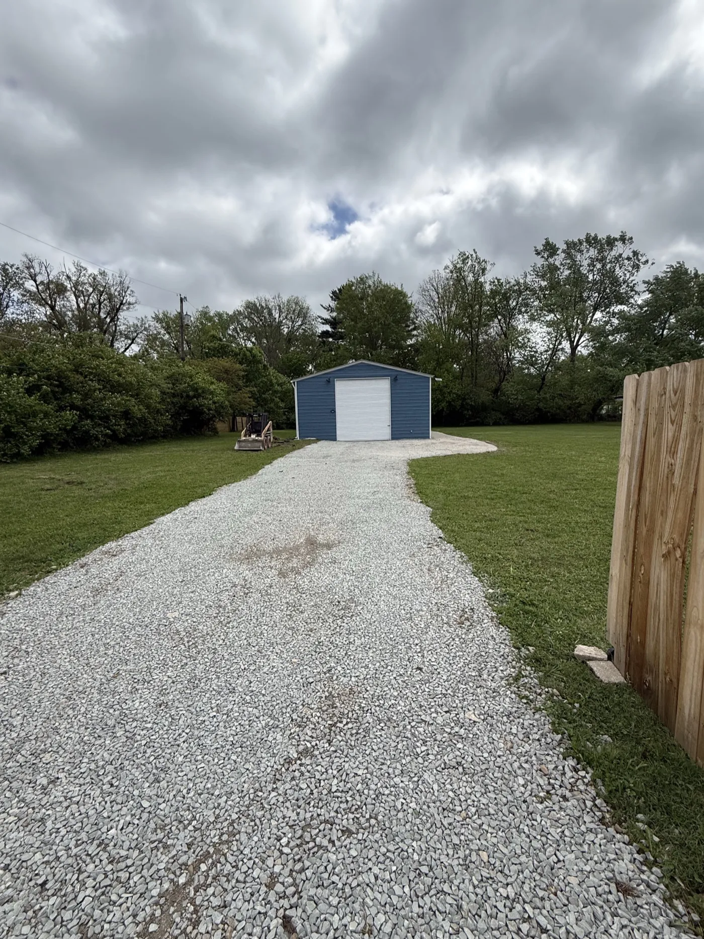 Gravel driveway installation at a property in central Indiana (photo 1)