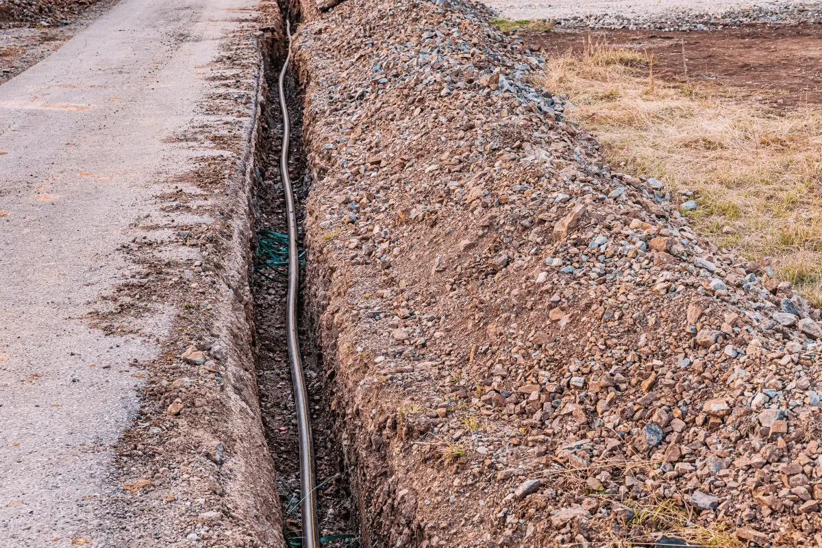 Trench excavated for a culvert and drainage pipe installation in Shelby County, Indiana