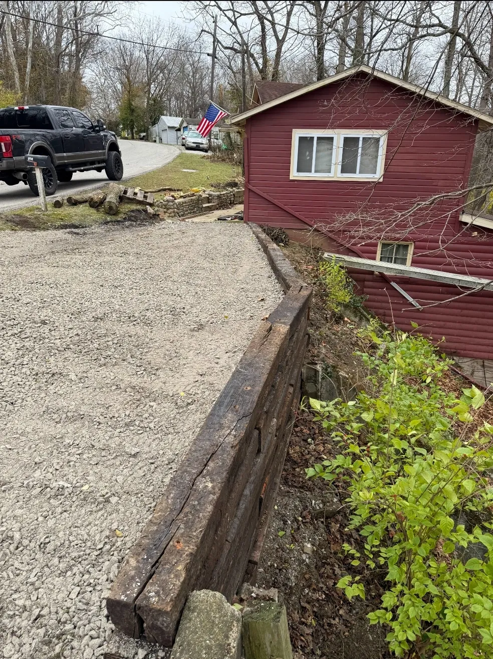 Gravel driveway with a railroad-tie edge in Shelbyville, Indiana