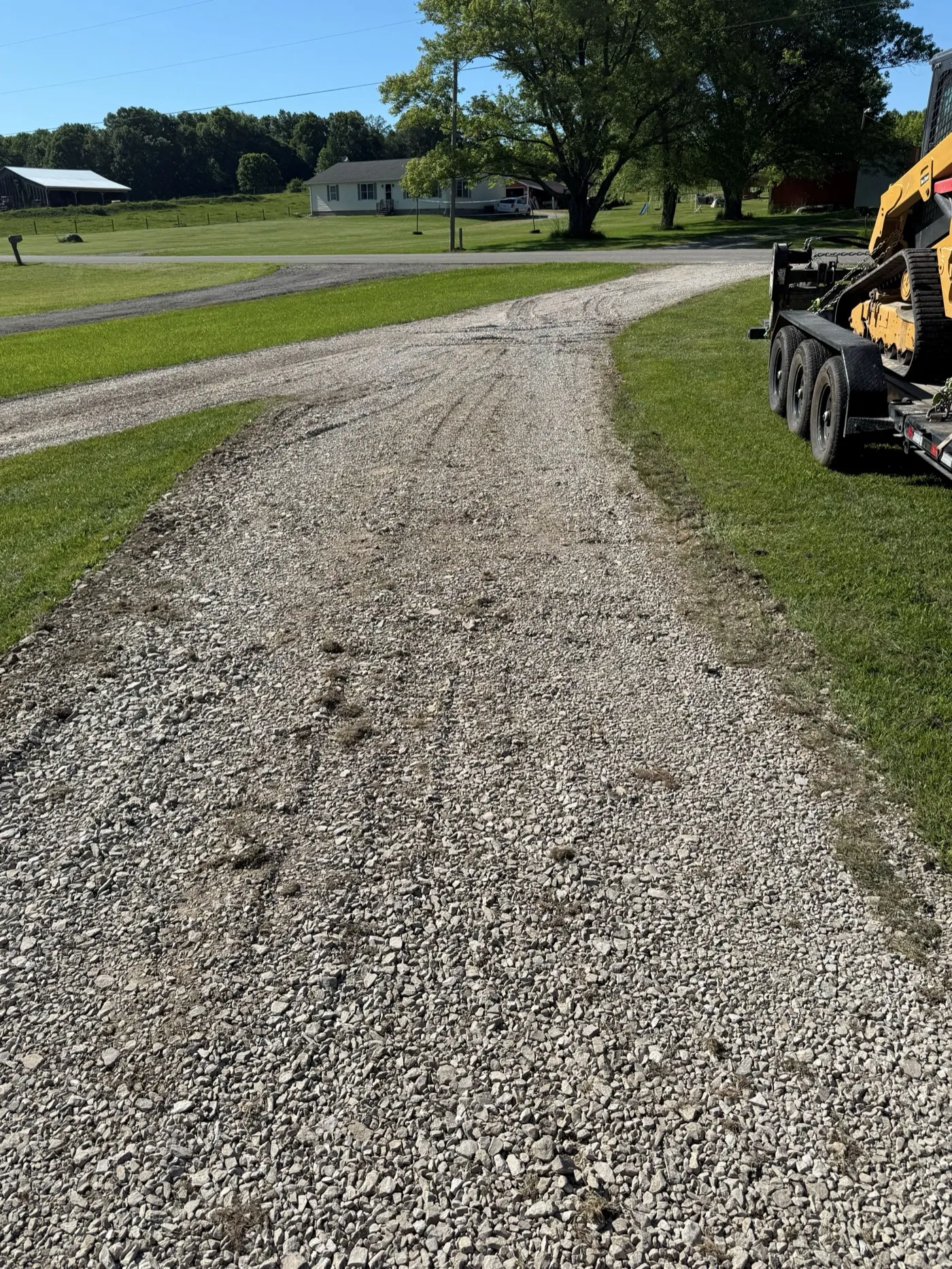 Regraded gravel driveway at a property in central Indiana (photo 1)